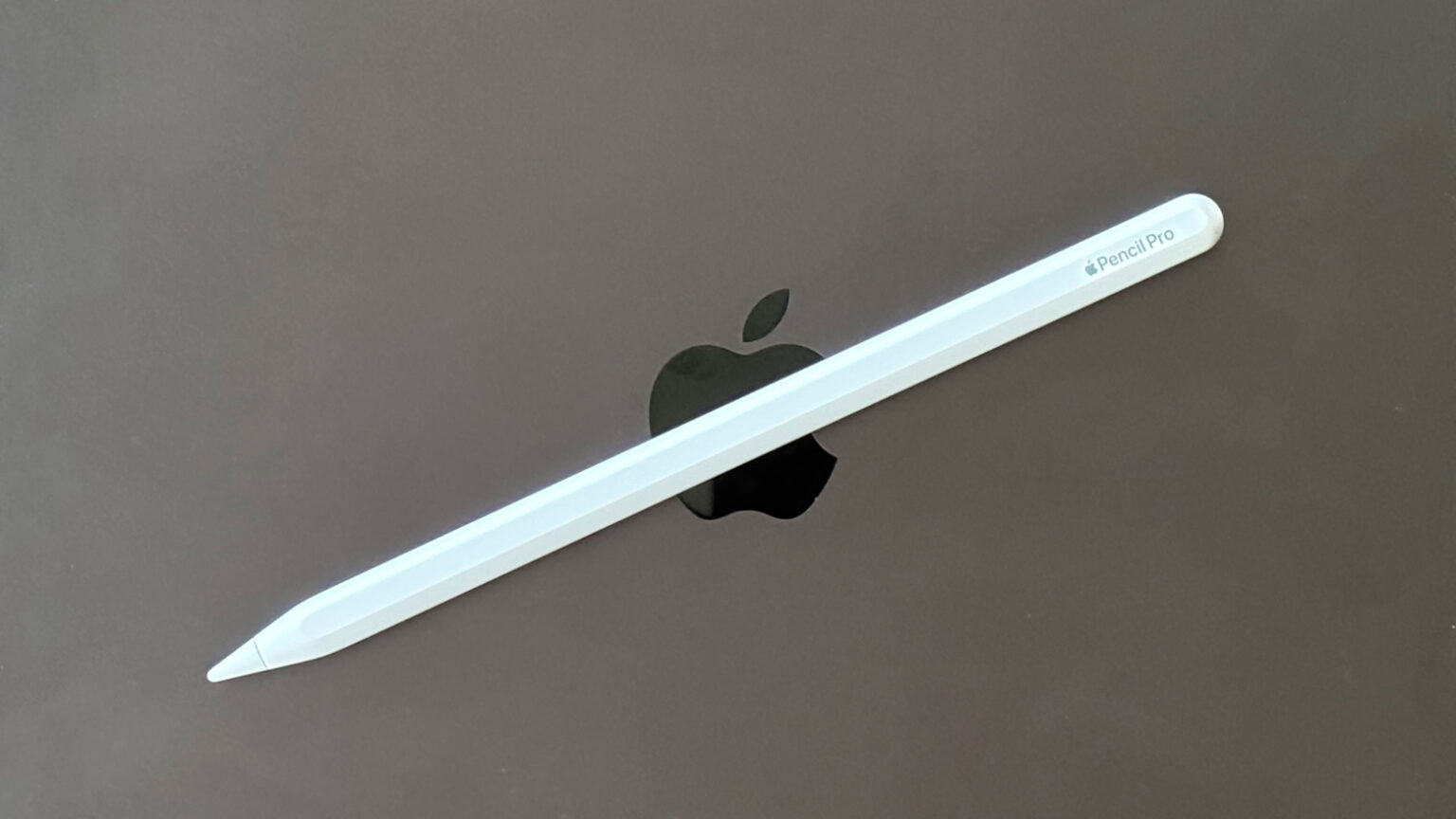 A photo of the new Apple stylus on an iPad illustrates this Apple Pencil Pro review.