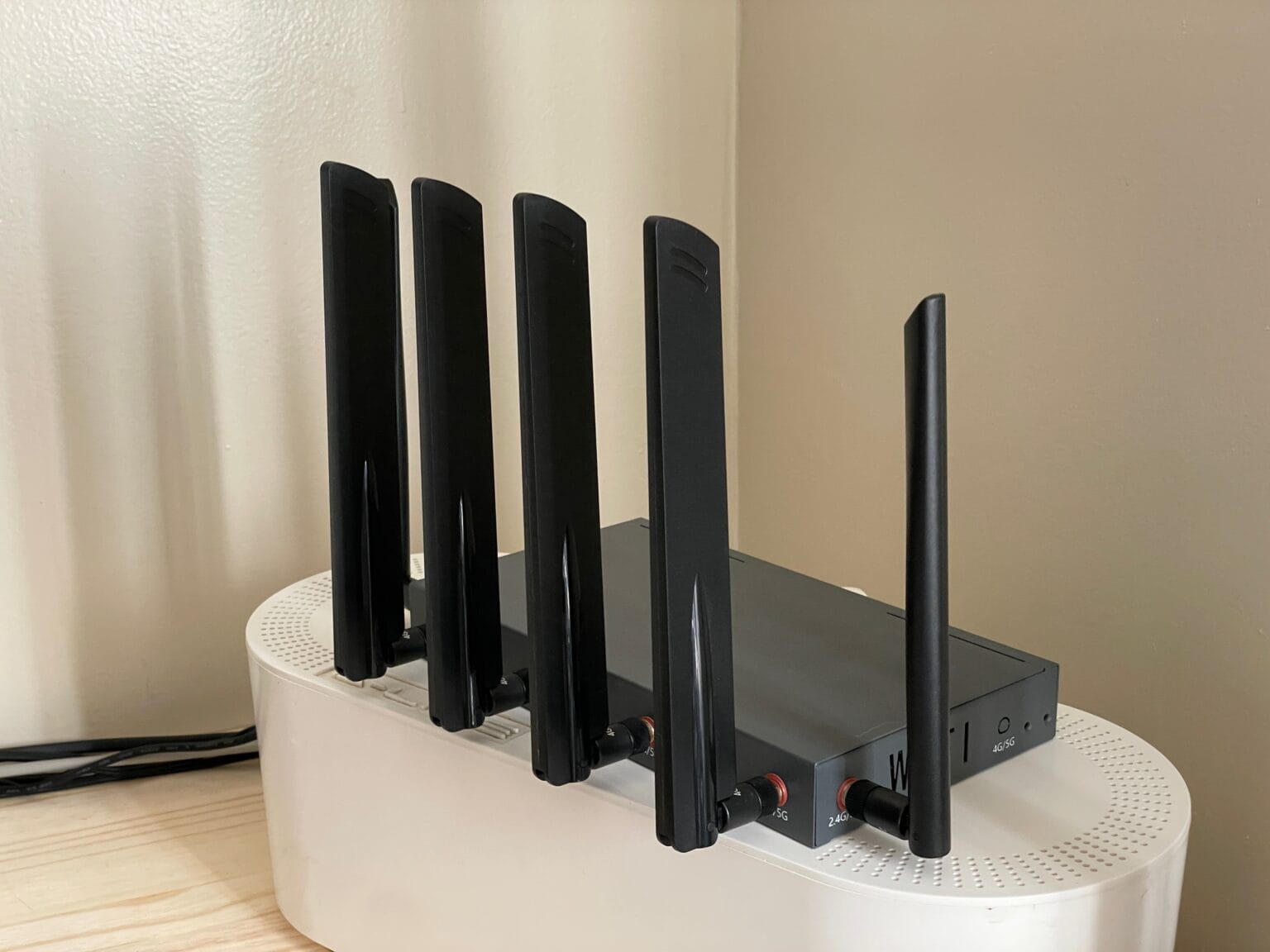 EZ Internet Solutions router sitting on a cable box