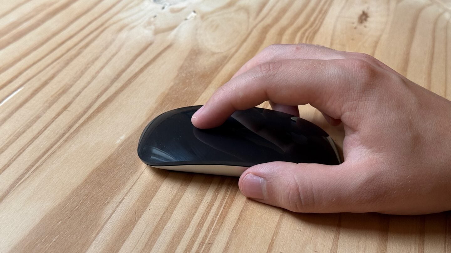 Holding a Black Magic Mouse