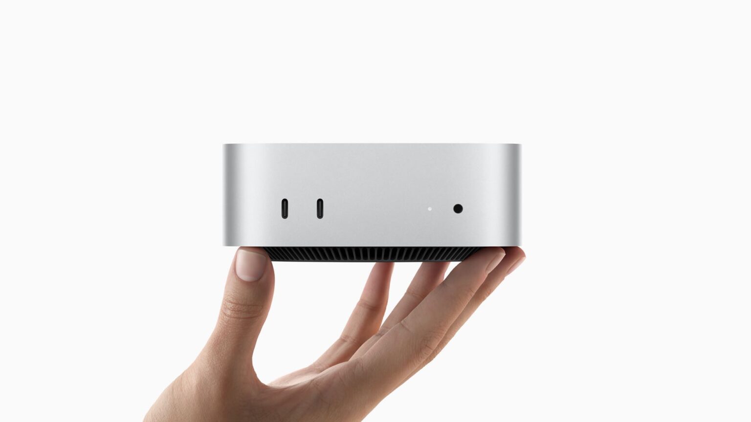 Mac mini M4 in hand