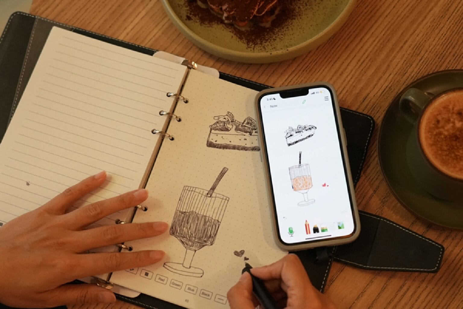 Photo of a person writing with the SyncPen 4 smartpen.